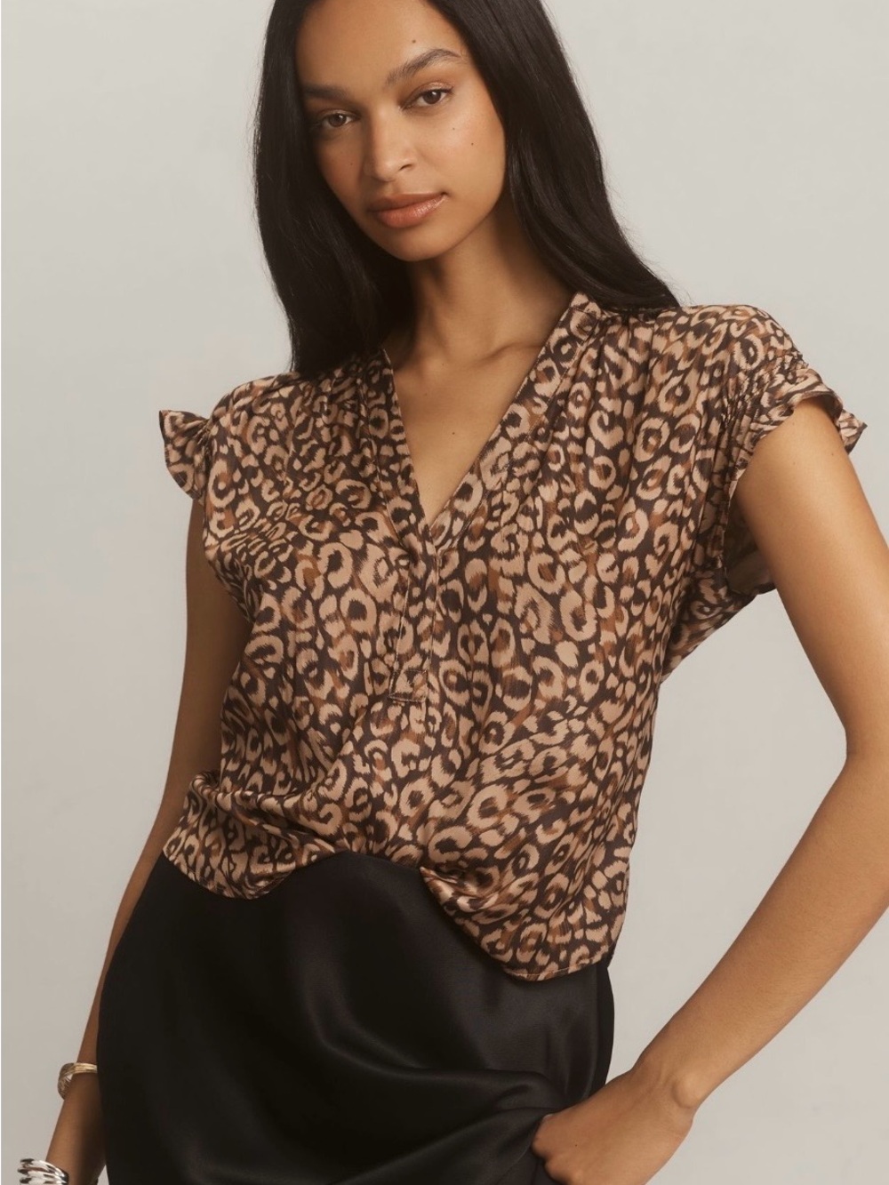 The Tatum Flutter-Sleeve Blouse by Pilcro:
Shine Edition